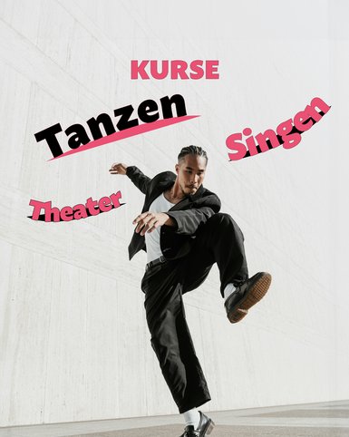 Ein Mann tanzt vor einer Häuserwand